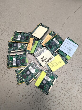 a pile of i.mx 8mq modules with various post its
