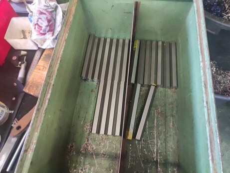 a box with 20 raw parts ready to be machined