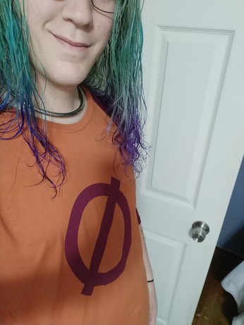 Maddy in a Mae (from NitW) shirt