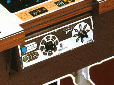 Controls for the Sheriff cocktail version. Players move their character with the left stick, aim by rotating the dial, and fire by pressing the dial inwards.