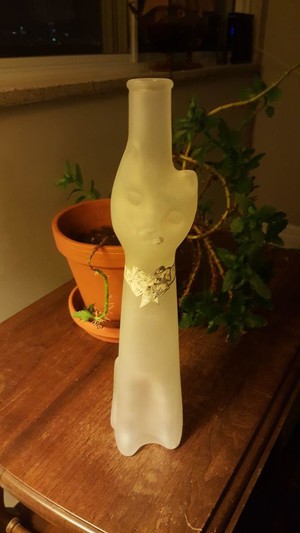 A bottle shaped like a cat