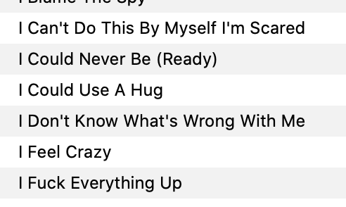 An iTunes screenshot listing songs, reading: "I can't do this by myself I'm scared, I could never be ready, I could use a hug, I don't know what's wrong with me, I feel crazy, I fuck everything up." 