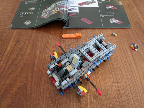Step 2 complete. More structure is now in place, including a flight stick and the pilot's chair.