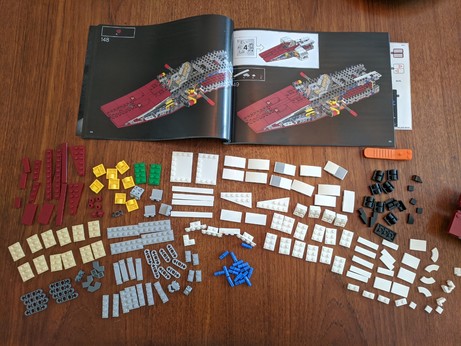 A multitude of LEGO pieces. There is no room for the model to appear in the picture.