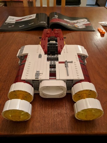 Rear view of the starship, which has a pretty impressive rear end. Sexy space fighter rump, you betcha.