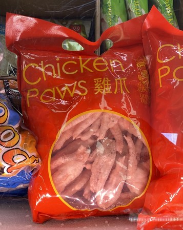 A bag of frozen “chicken paws”