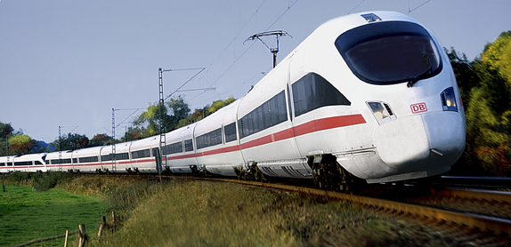 a really modern-looking white train with a single red stripe on the side, the windows are a continuous black stripe above that. the front of the train is all aerodynamic and stuff