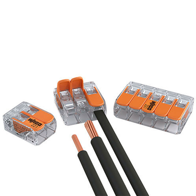 three of Wago's "lever-nuts" connectors, a two-wire, three-wire, and five-wire one, all the new low-profile style. There's a wire plugged into the middle one and two other wires not plugged in, showing how you can just use the levers to lock them in place.