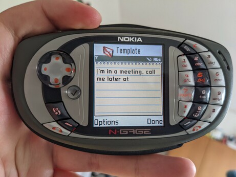 a SMS template that reads "I'm in a meeting, call me later at"