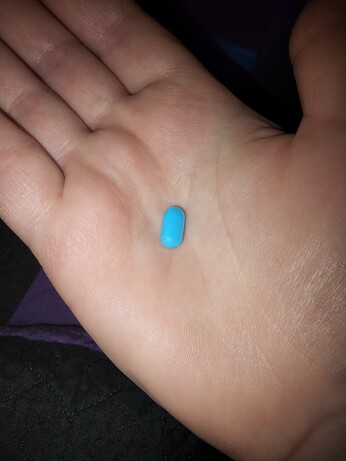 Night time flu pill, colored blue.