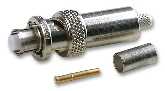 A disassembled SHV plug. It's like a reverse-polarity BNC with a very extended shield and insulation; the actual center contact is recessed deep inside. This is designed for high-voltage stuff, with the intent being that it's not possible to touch the center contact whether the connector is mated or not (a flaw of the older MHV connector was that it was only touch-safe in the mated condition; when not mated, the center contact on the plug could be touched)